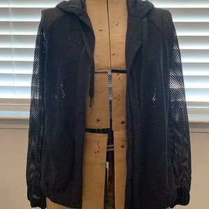 lululemon mesh reversible zip up hoodie in black size 6 with pockets.